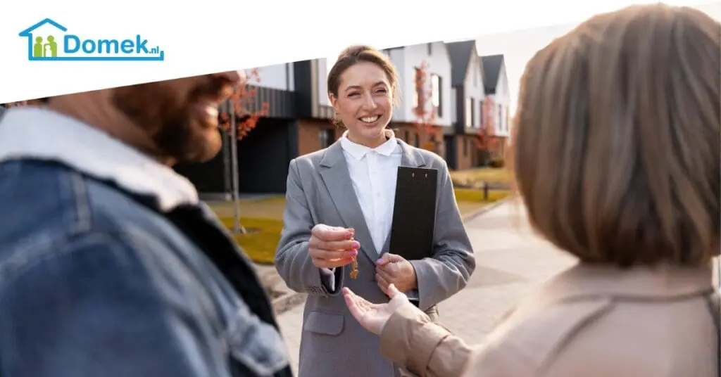 Couple receiving house keys after investing in property in the Netherlands