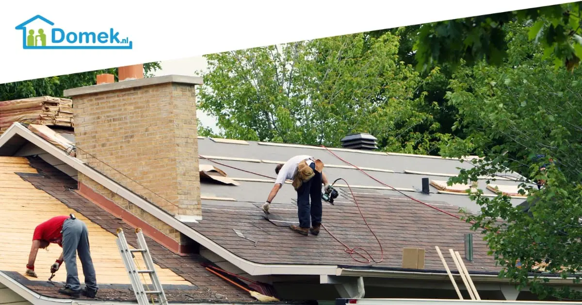 Workers replacing the roof of a typical Dutch house during a roof renovation project